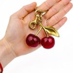 تعليقة شنطة الكرز اللامعة من فاست فيري